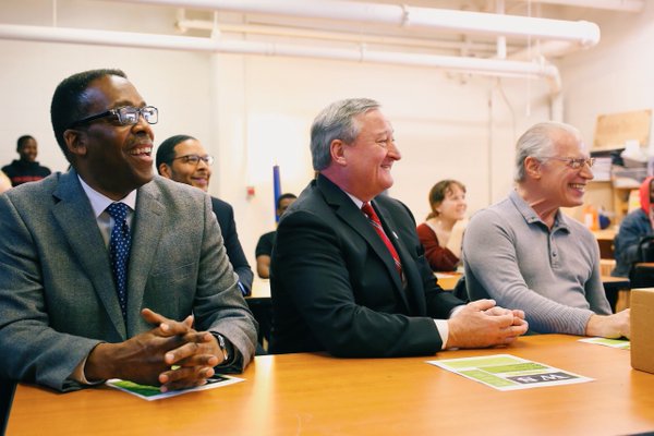 City Council President Darrell Clarke and Mayor Jim Kenney listen to a presentation at the Workshop School.