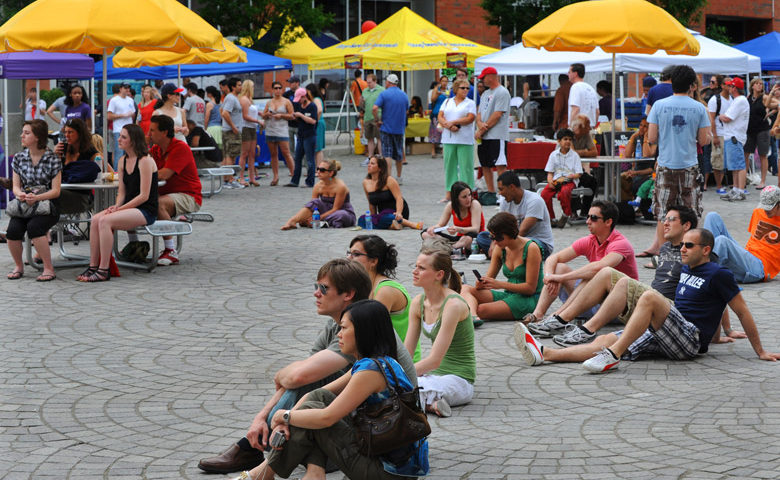 People relax in the plaza at Schmidt's Commons in Northern Liberties. (Photo by R. Kennedy for Visit Philadelphia).